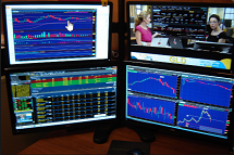 Trade Station Computer with four display monitors.